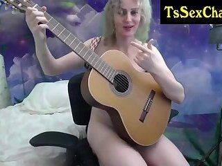 Thin tranny girl likes showing a guitar on cam - ashemaletube.com on ashemaleporn.com