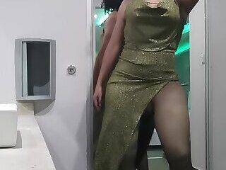 Sexy crossdresser in highheels Green dress girl facemask - ashemaletube.com on ashemaleporn.com